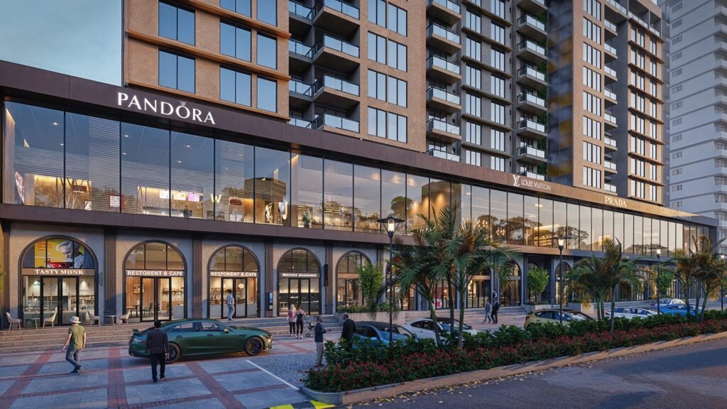 Luxury mixed-use commercial development featuring retail storefronts, restaurants, landscaped boulevard, and modern residential towers.