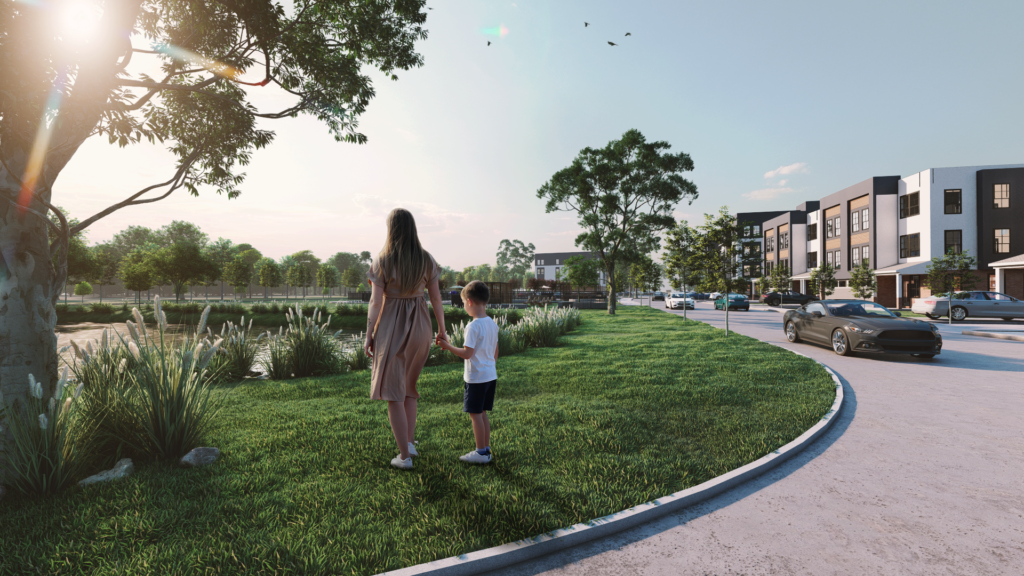 Modern residential community with landscaped park, walking paths, apartment buildings, and mother walking with child at sunset.