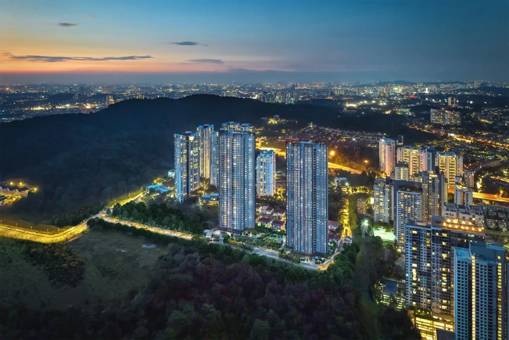 Aerial view of high-rise residential buildings at sunset.