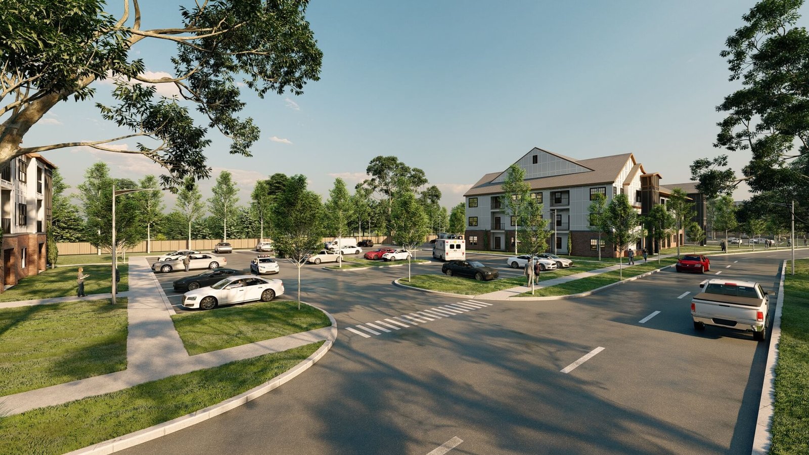 Daytime exterior view of mid-rise residential buildings surrounding central green space with trees and pathways