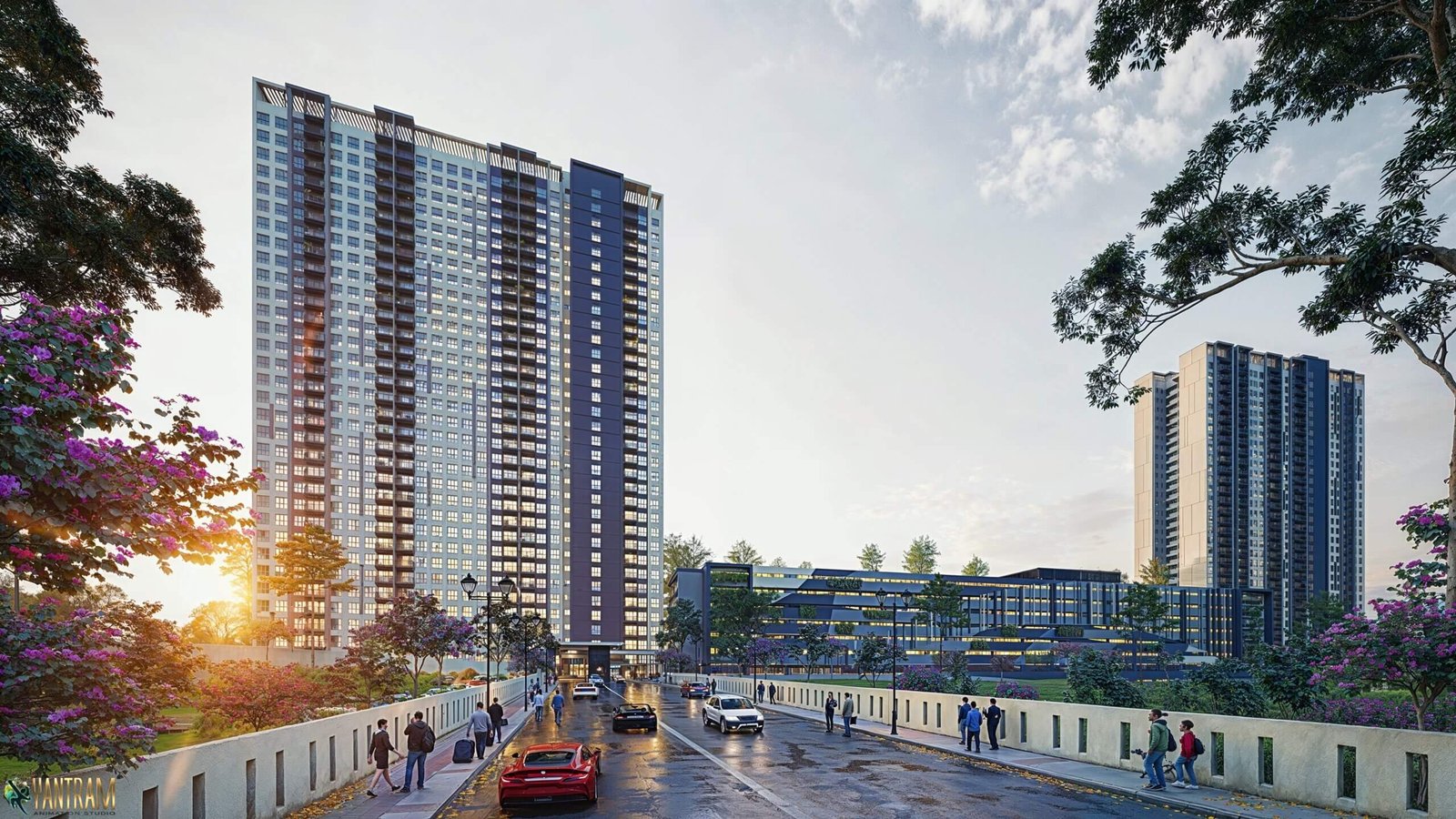 Modern twin residential high-rise towers with illuminated balconies, landscaped boulevard, pedestrians, and sunset skyline view.