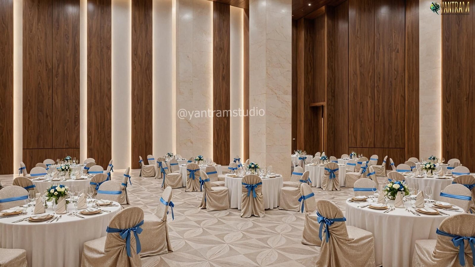 Luxury Banquet Hall Interior Setup | Yantram Studio Elegant banquet hall with round dining tables, white tablecloths, blue chair sashes, floral centerpieces, and tall wooden wall panels.